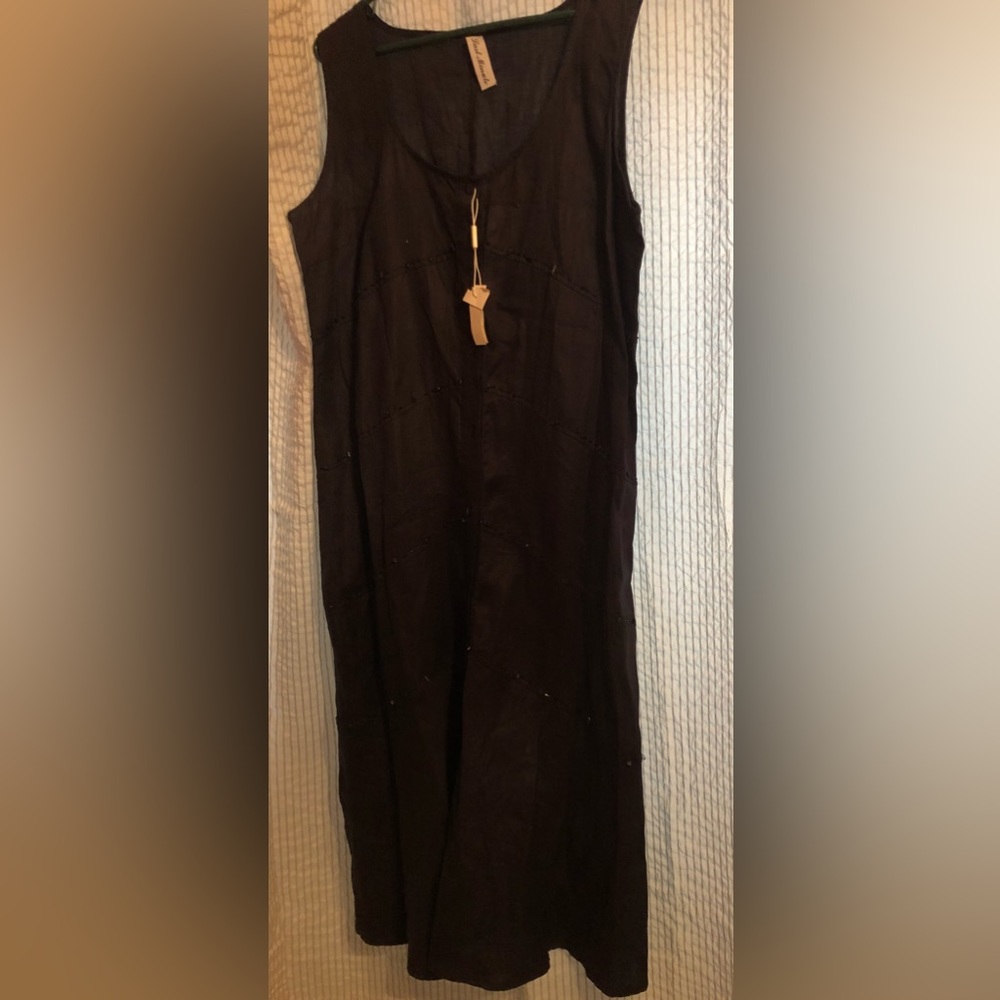 Italian boutique. Sleeveless Black dress. Purchased while in Italy. Brand new.